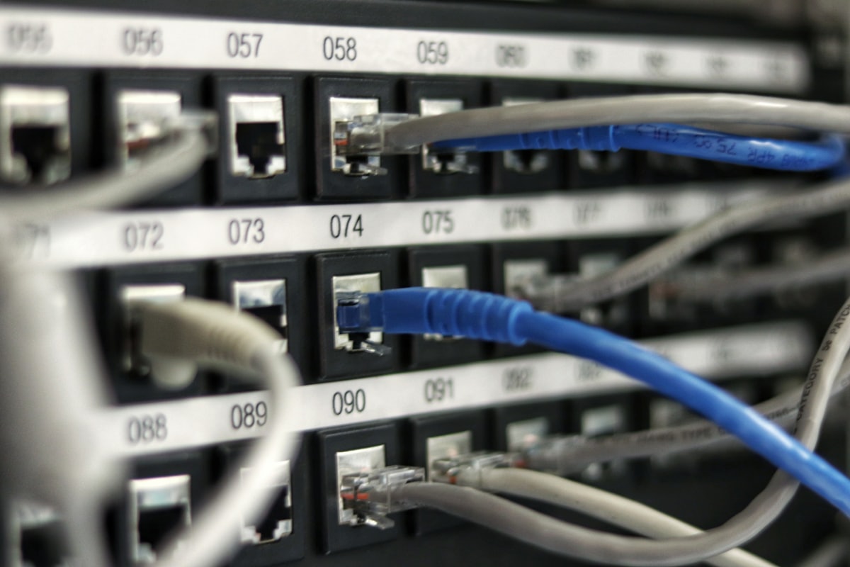 Illuminated server racks inside a data centre